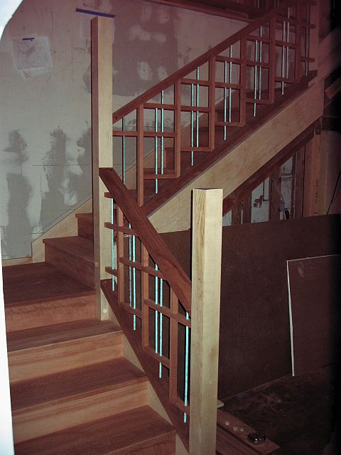 LIPTUS, MAPLE & METAL DOWEL STAIR & RAIL (front view of the bottom flight, lower landing, middle flight, posts & railing)