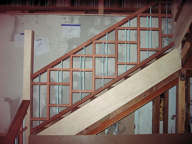 LIPTUS, MAPLE & METAL DOWEL STAIR & RAIL (view of the outside middle flight, posts & railing)